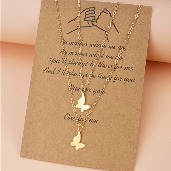 Jewelry - Two butterfly necklaces.  Stack or share.